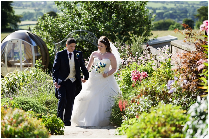 bride and groom heaton house farm water gardens