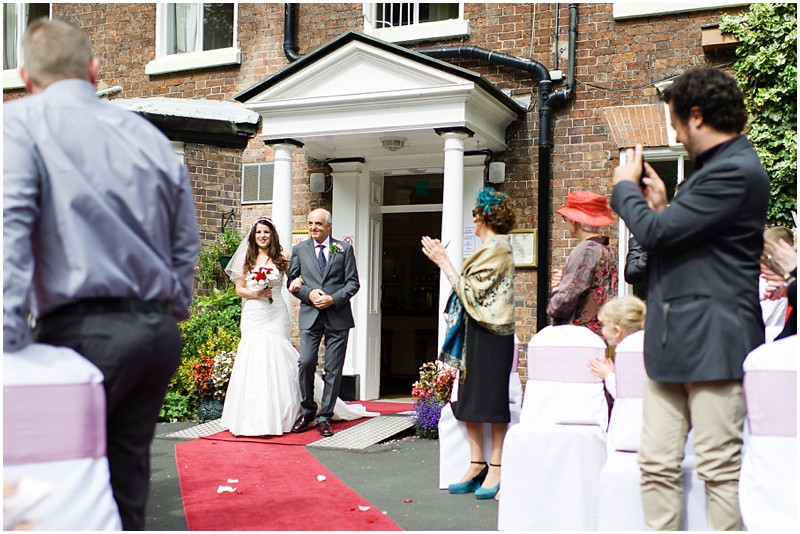 bride walks down the isle