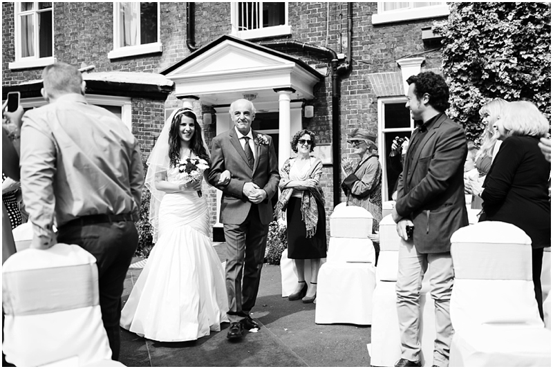 bride walks down the isle
