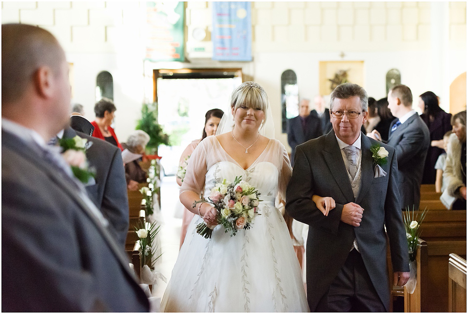 bride arriving at altar