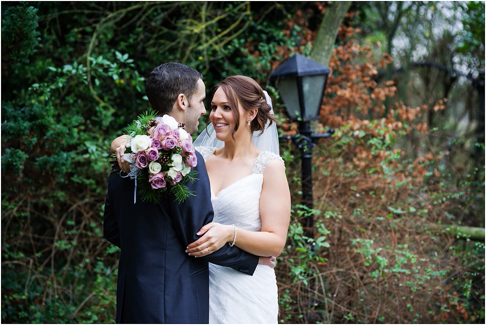 bride and groom at christmas wedding at hundred house
