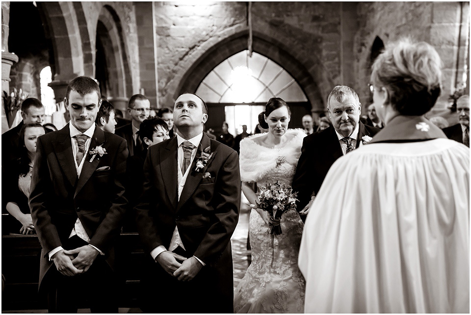 groom nervously awaits bride