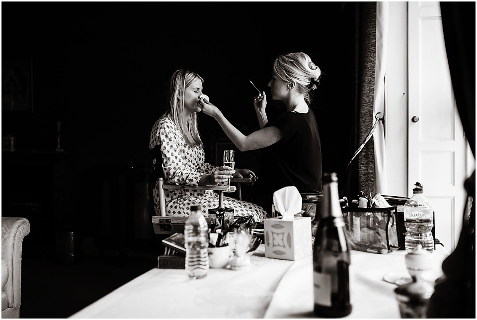 bride getting make up done at thrumpton