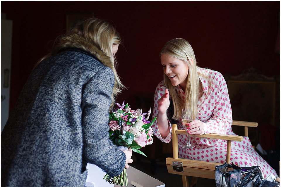 bridal receiving flowers at thrumpton hall