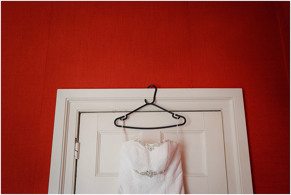 brides dress hanging up at thrumpton hall