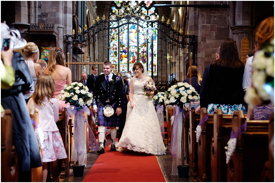 bride and groom leaving church