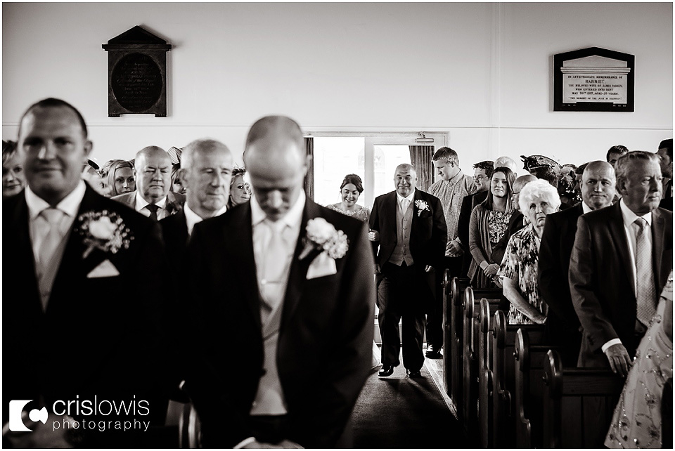 bride walks down the isle