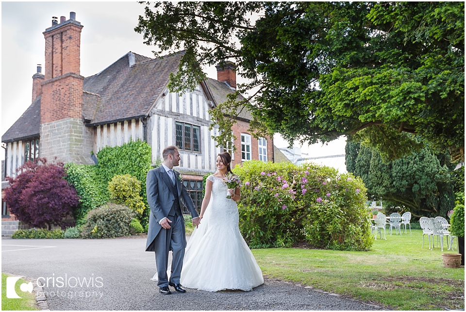 bride and groom at the moat house acton trussell wedding