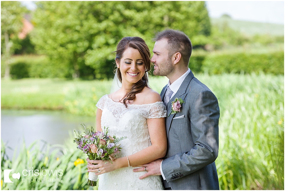 bride and groom at the moat house acton trussell wedding
