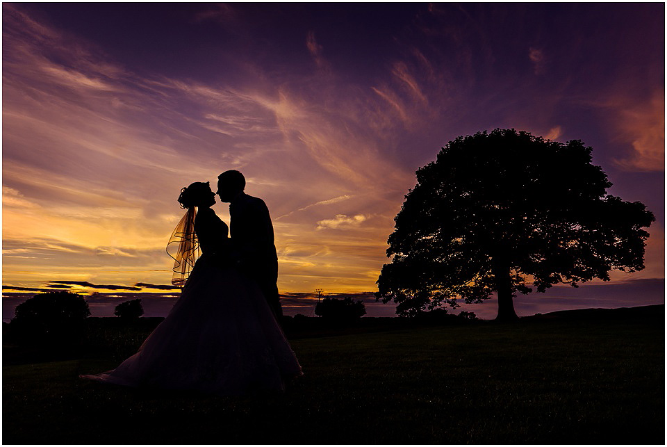 sunset wedding photo at heaton house farm