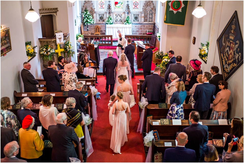 bride walks down isle
