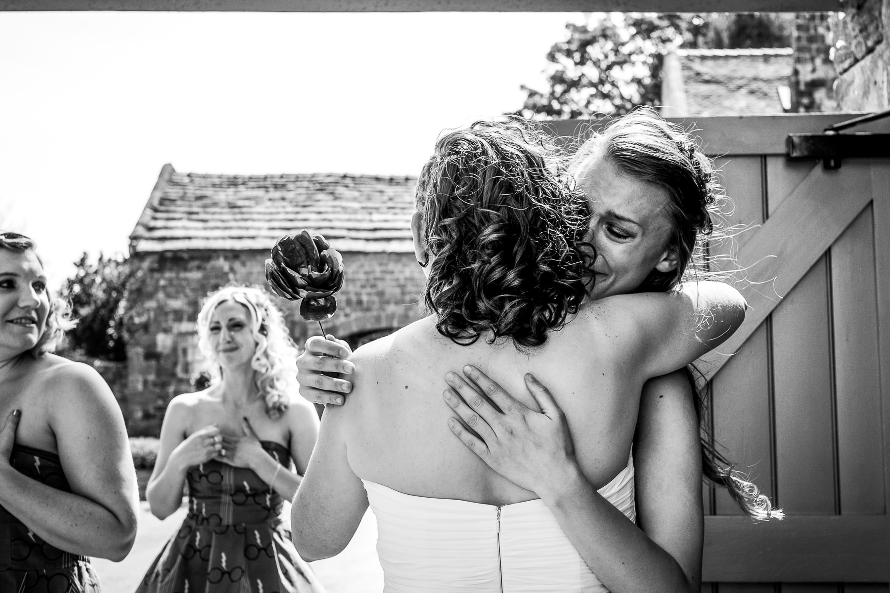 big hug at a wedding