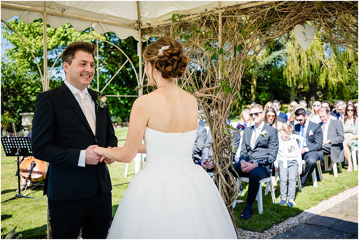 outdoor wedding ceremony at albright hussey mannor