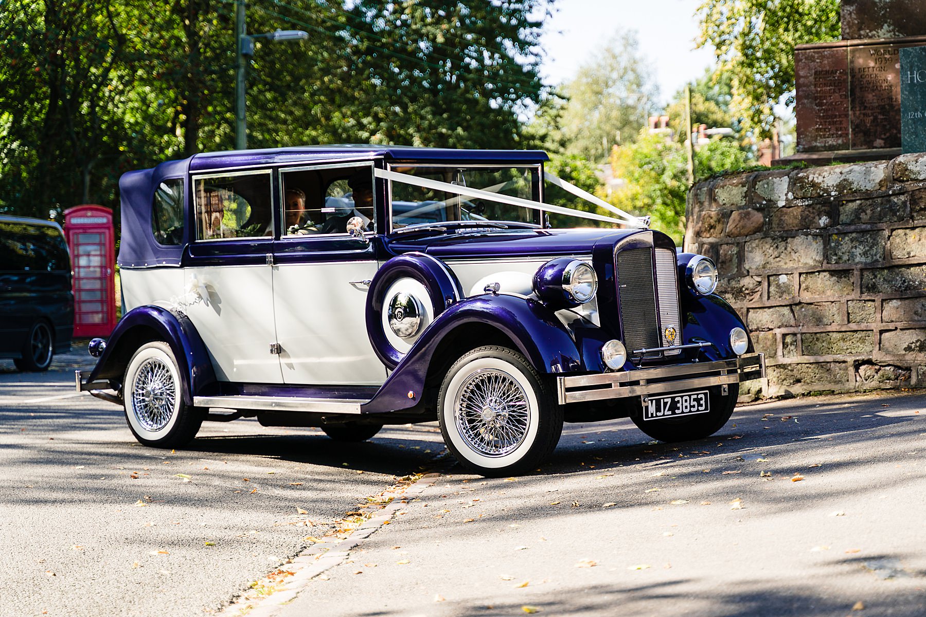 bride arrives in wedding car