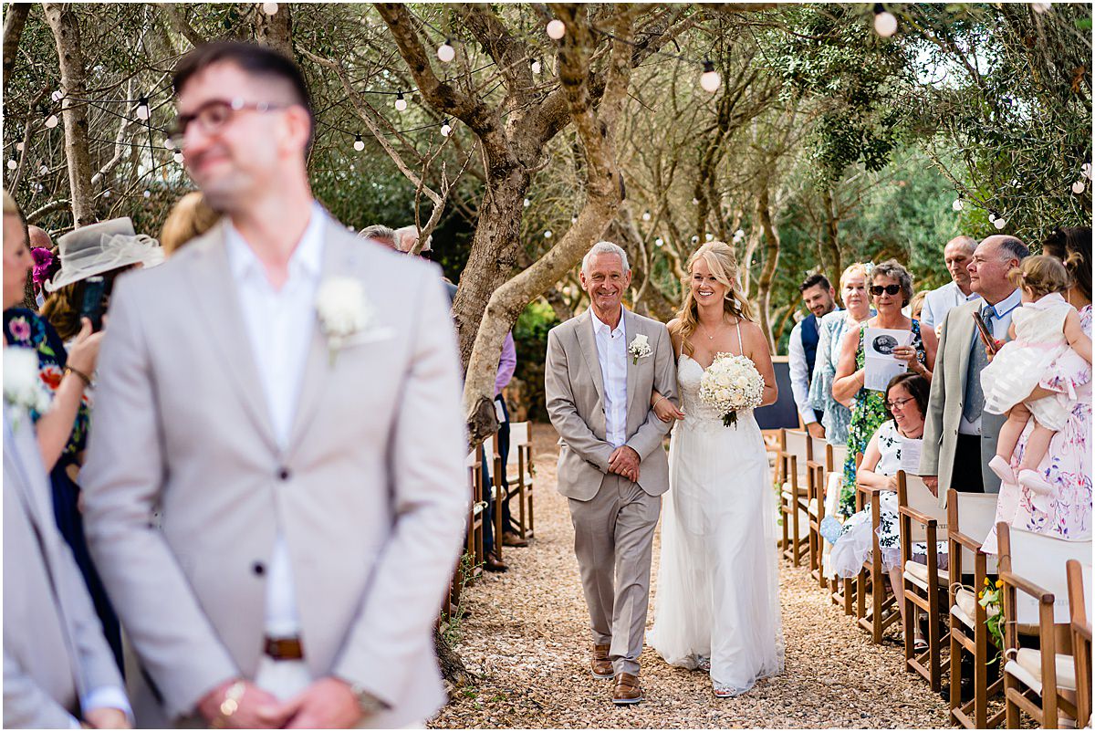 bride walks down the isle