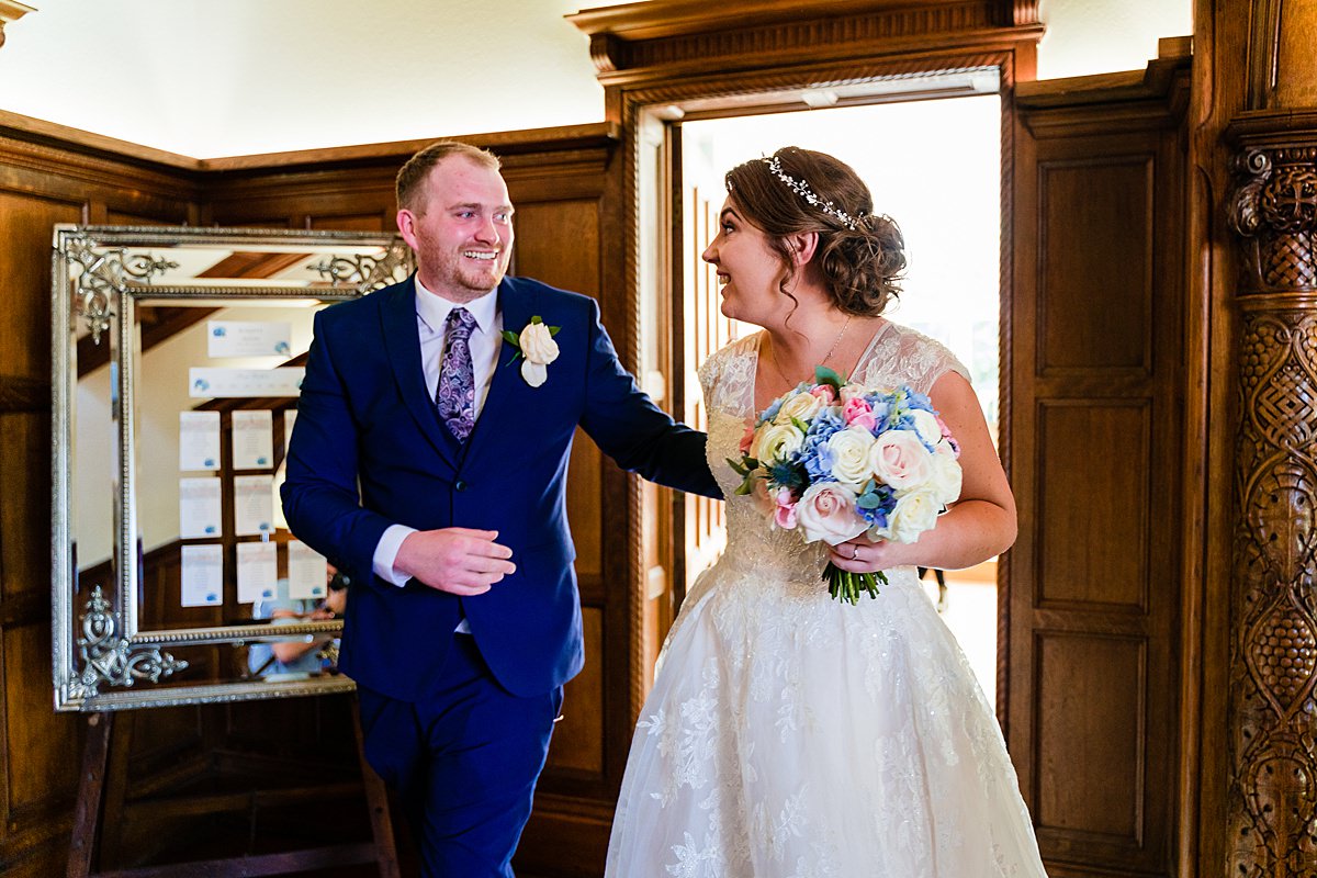 bride and groom cuddle after wedding