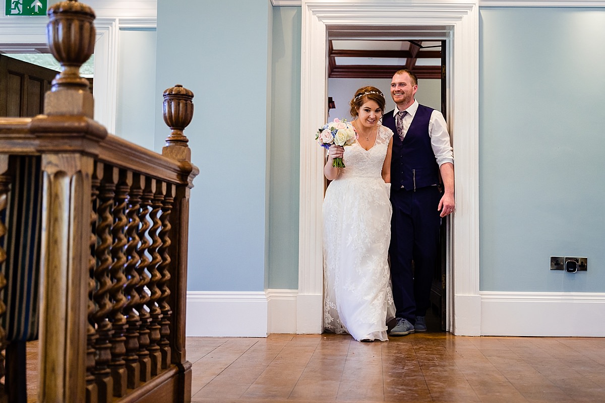 bride and groom enter room