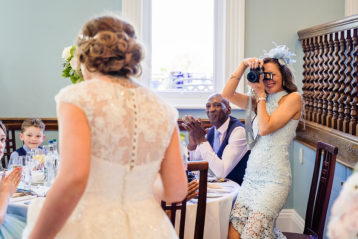 bride and groom enter room