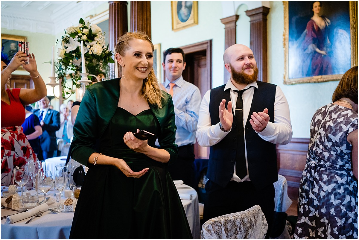 bride and groom enter dining room