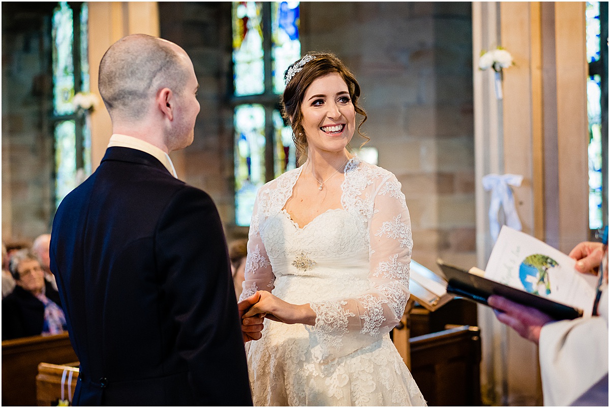 wedding ceremony at all saints church leigh