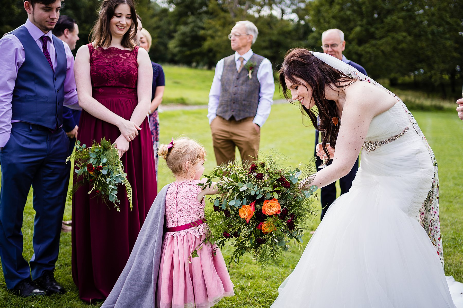 guests greet couple