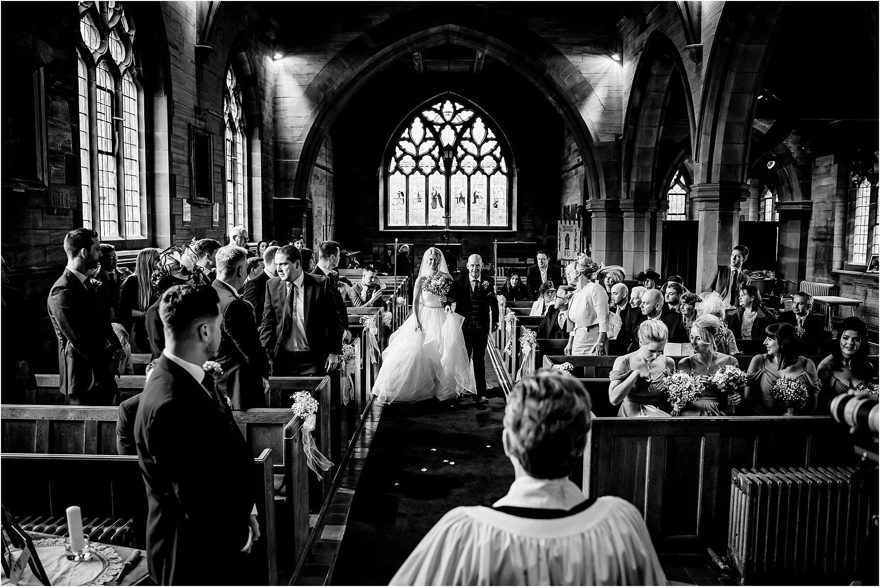 bride walkimng down isle