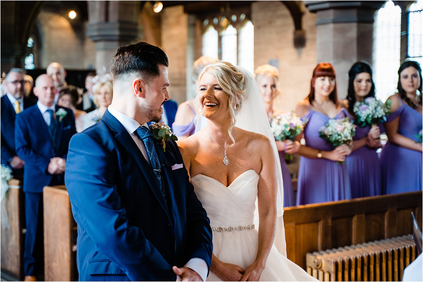 bride arrives at end of isle