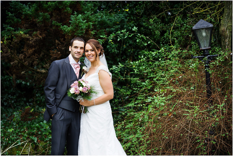 bride and groom at christmas wedding at hundred house