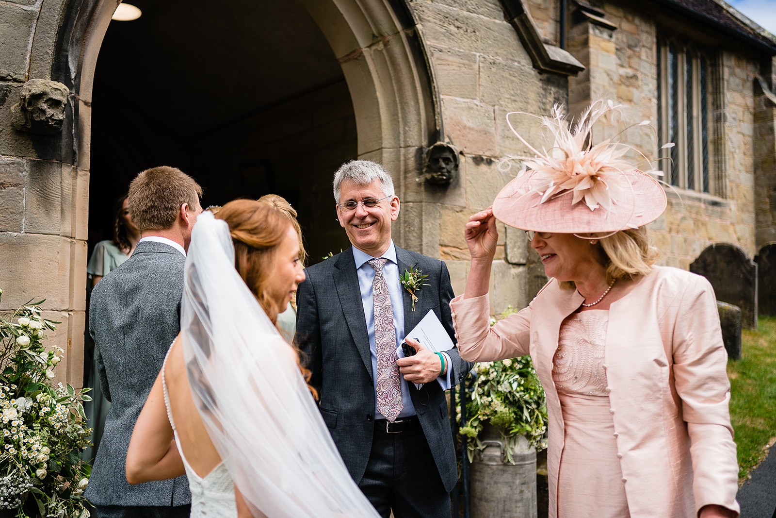 guests congratulate couple
