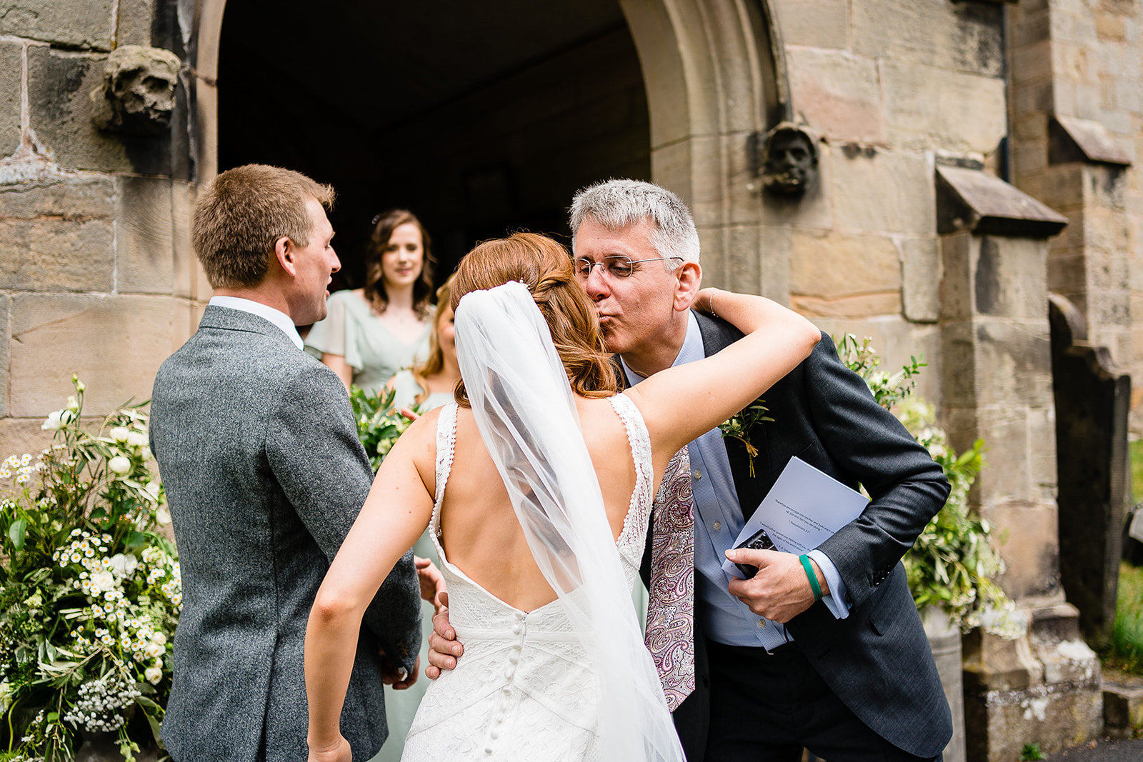 guests congratulate couple