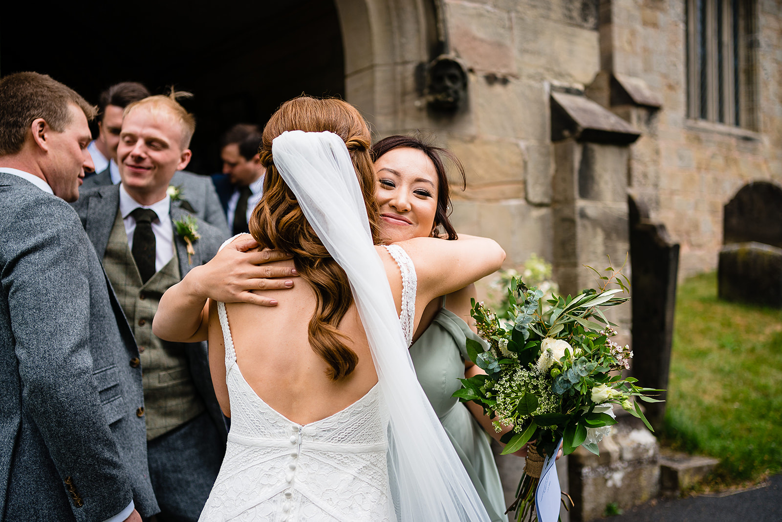 guests congratulate couple