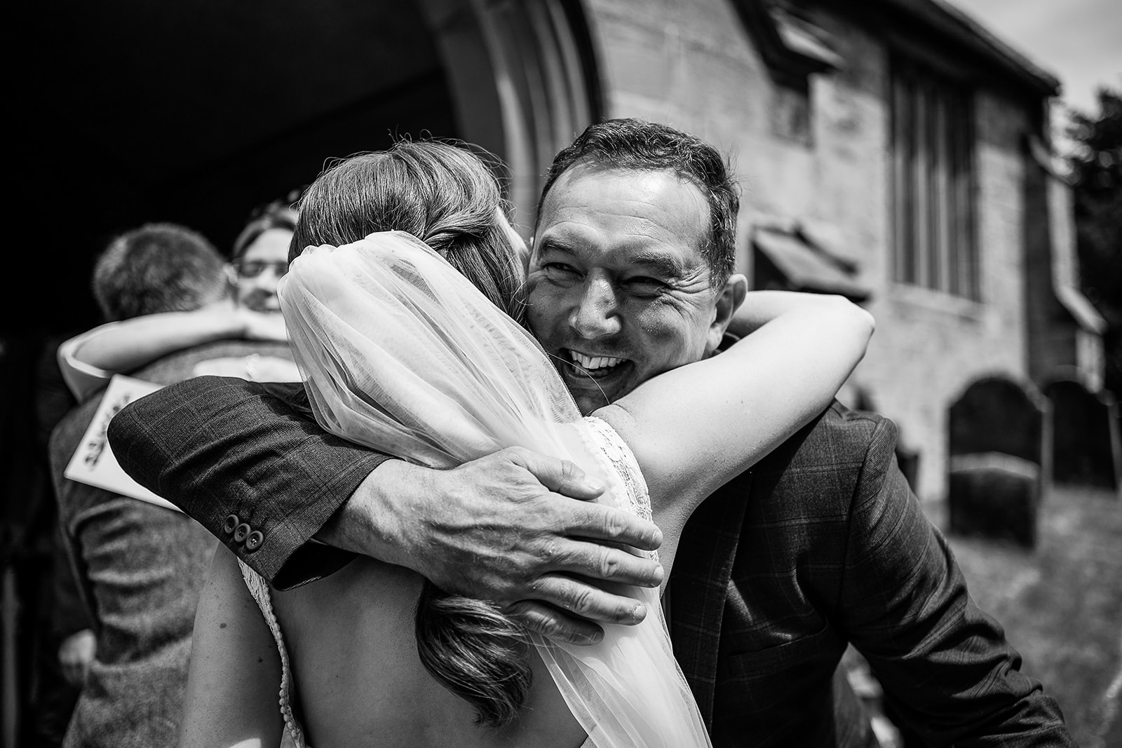 guests congratulate couple
