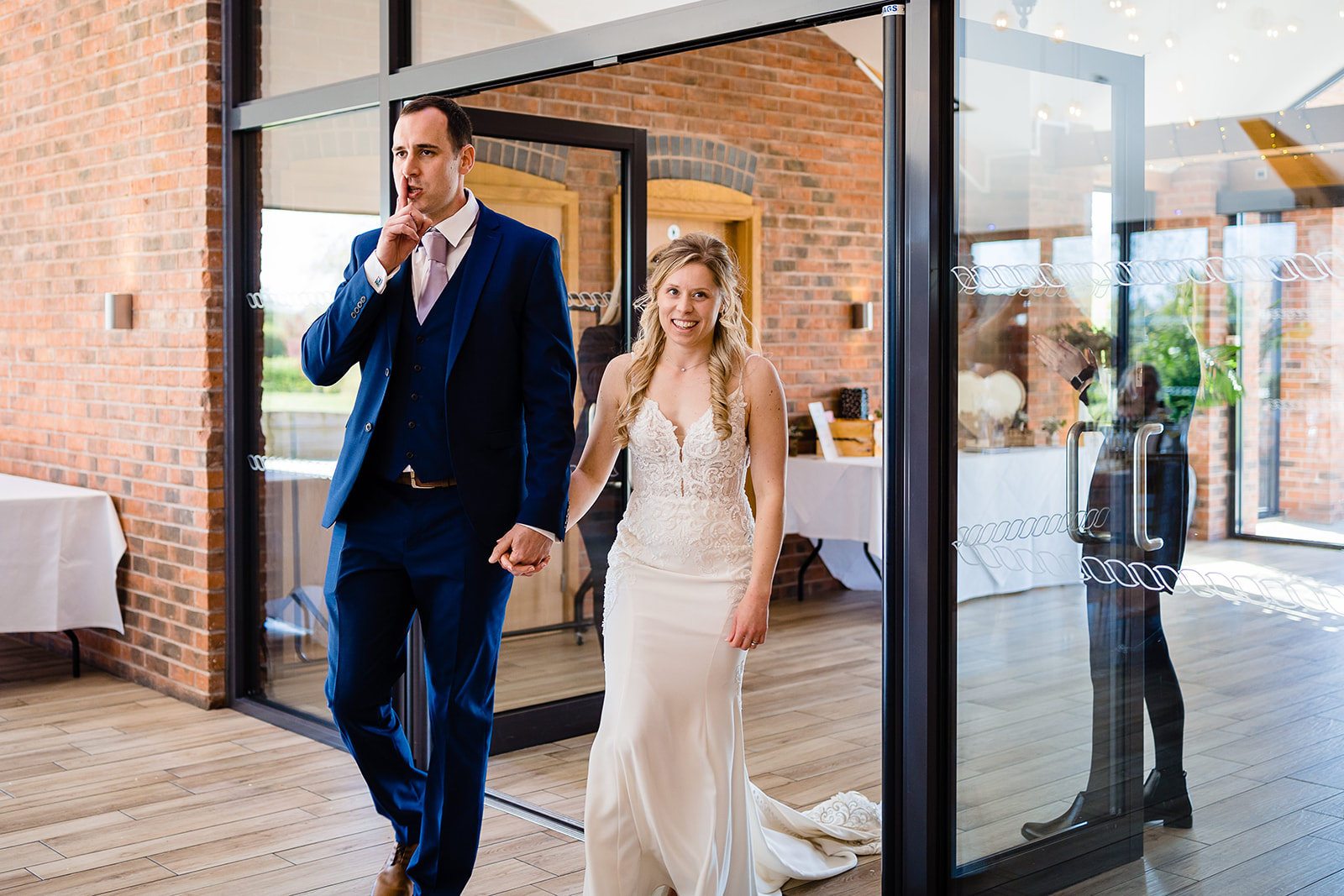 bride and groom enter room