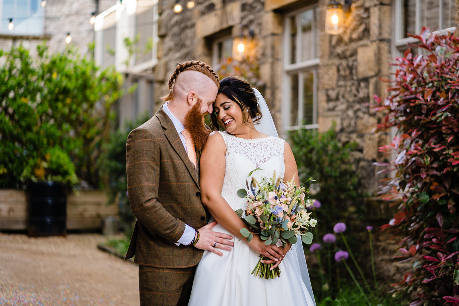 bride and groom at holmes mill