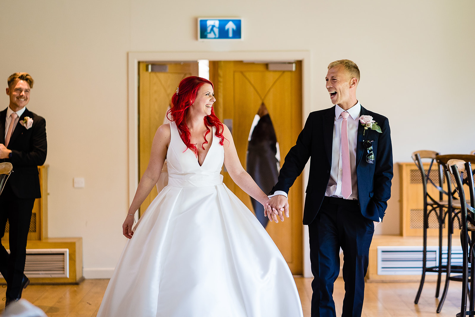 bride and groom enter room