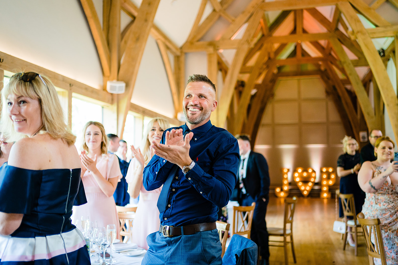 bride and groom enter room
