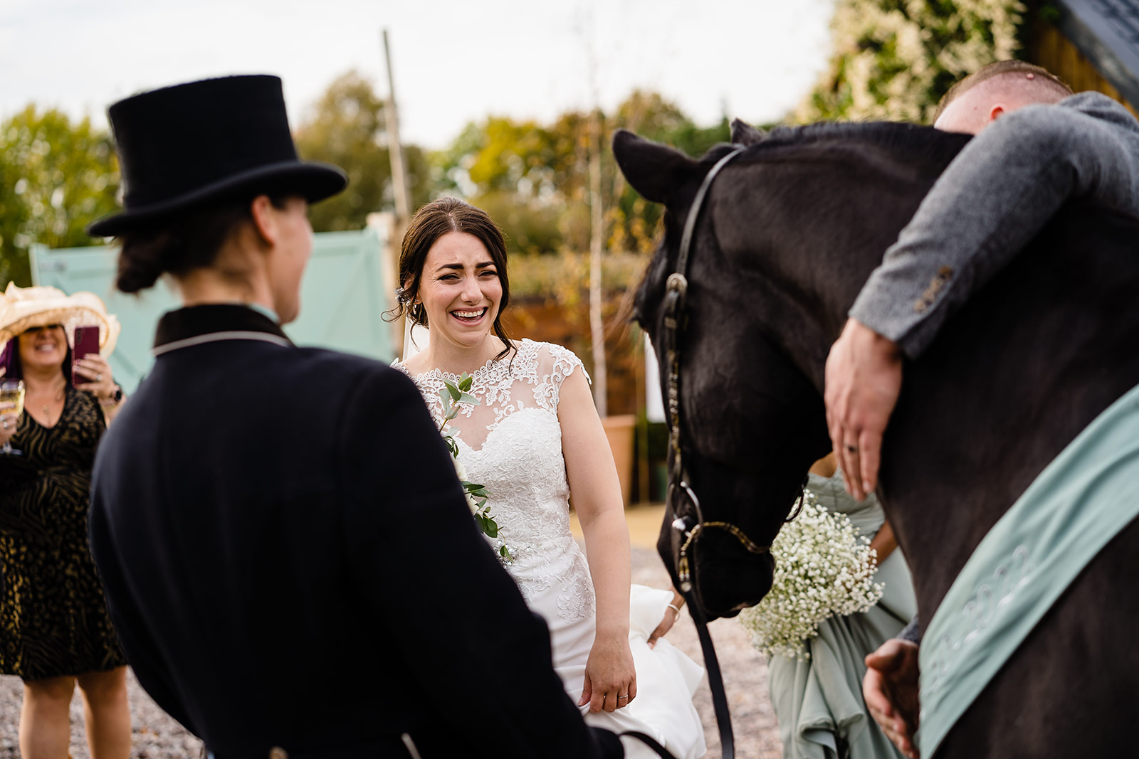 bride and groom see horse