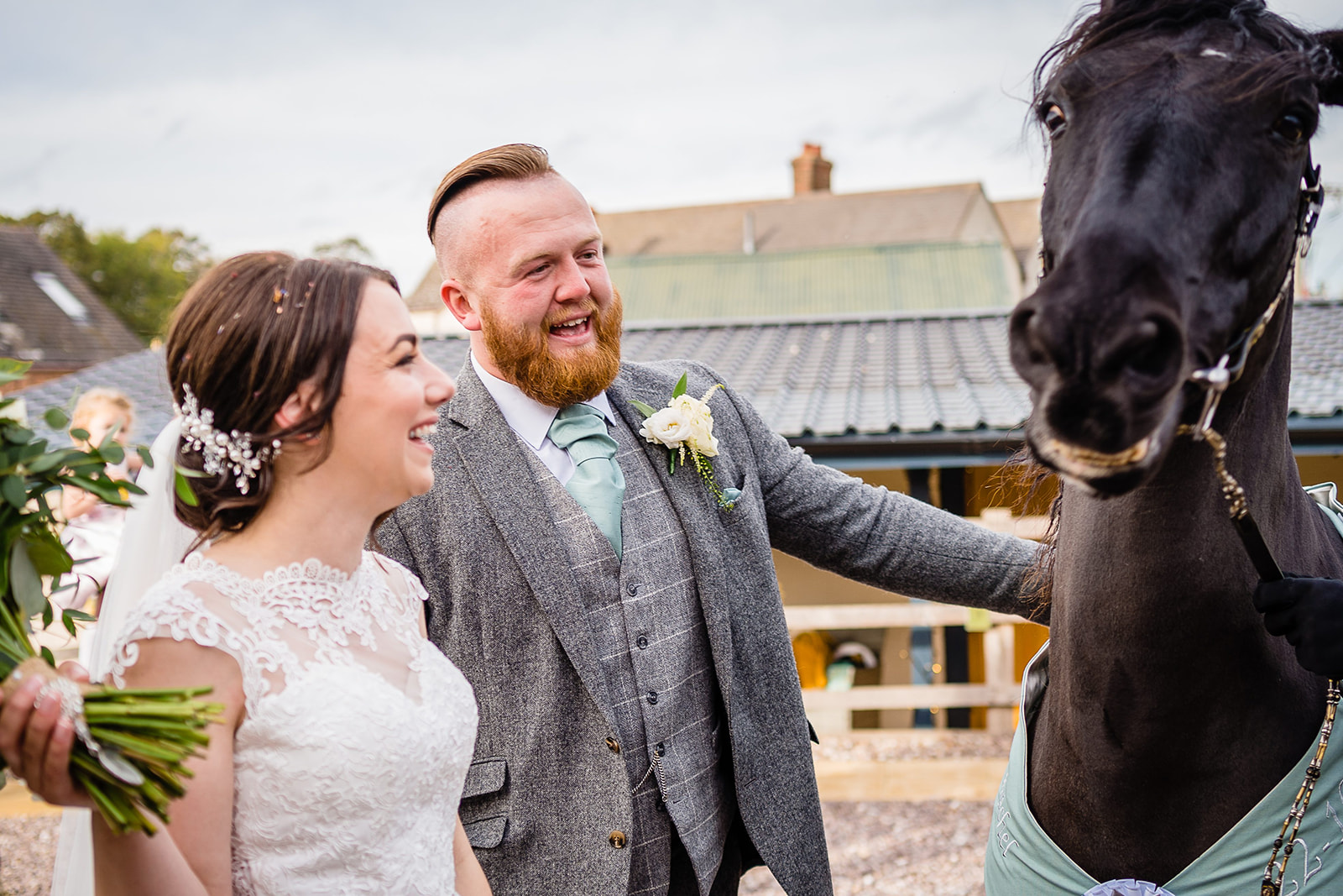 bride and groom see horse