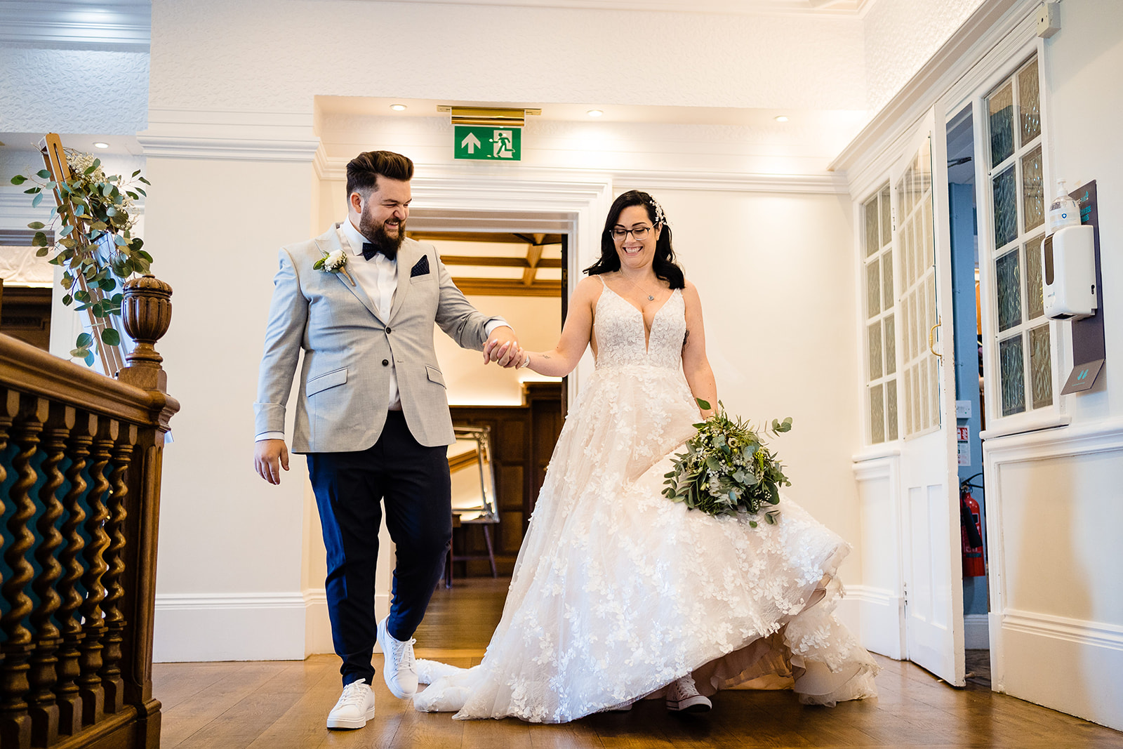 bride and groom enter room