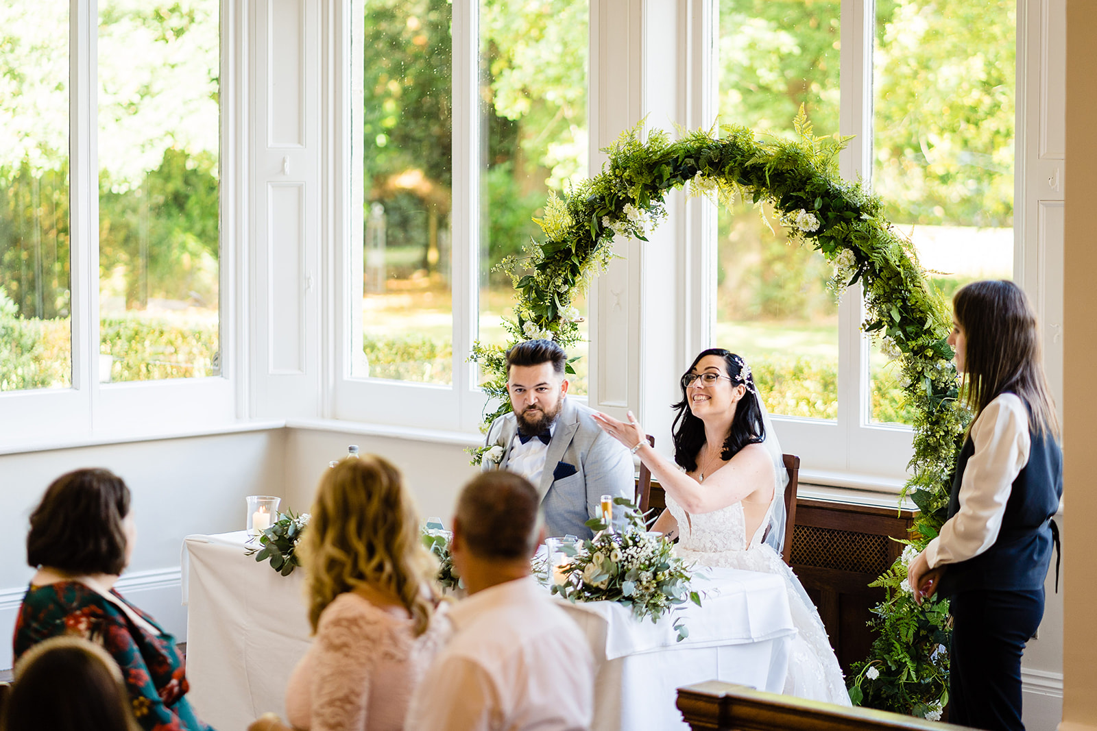 bride and groom enter room